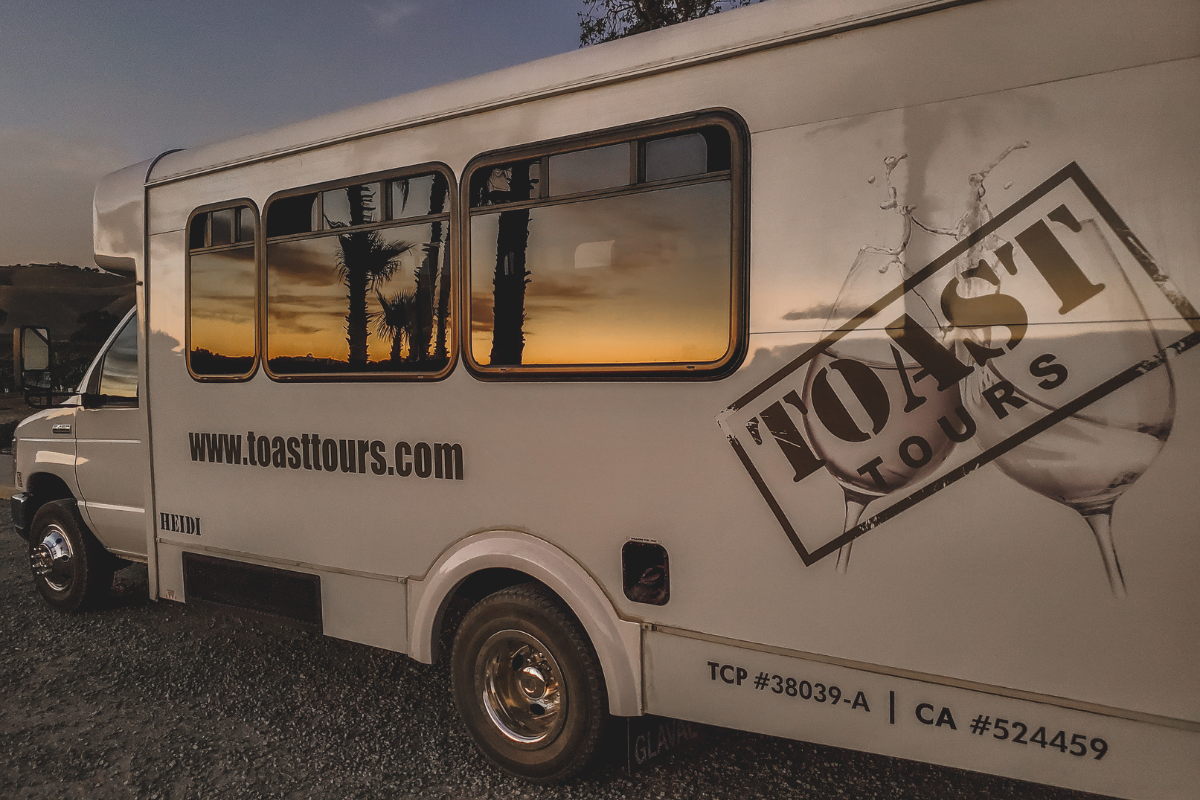 wine tour transportation vehicle at sunset