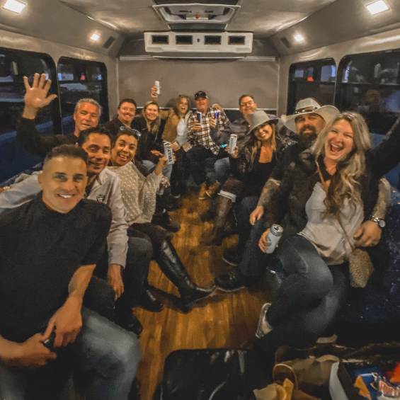 Group having fun in wine shuttle