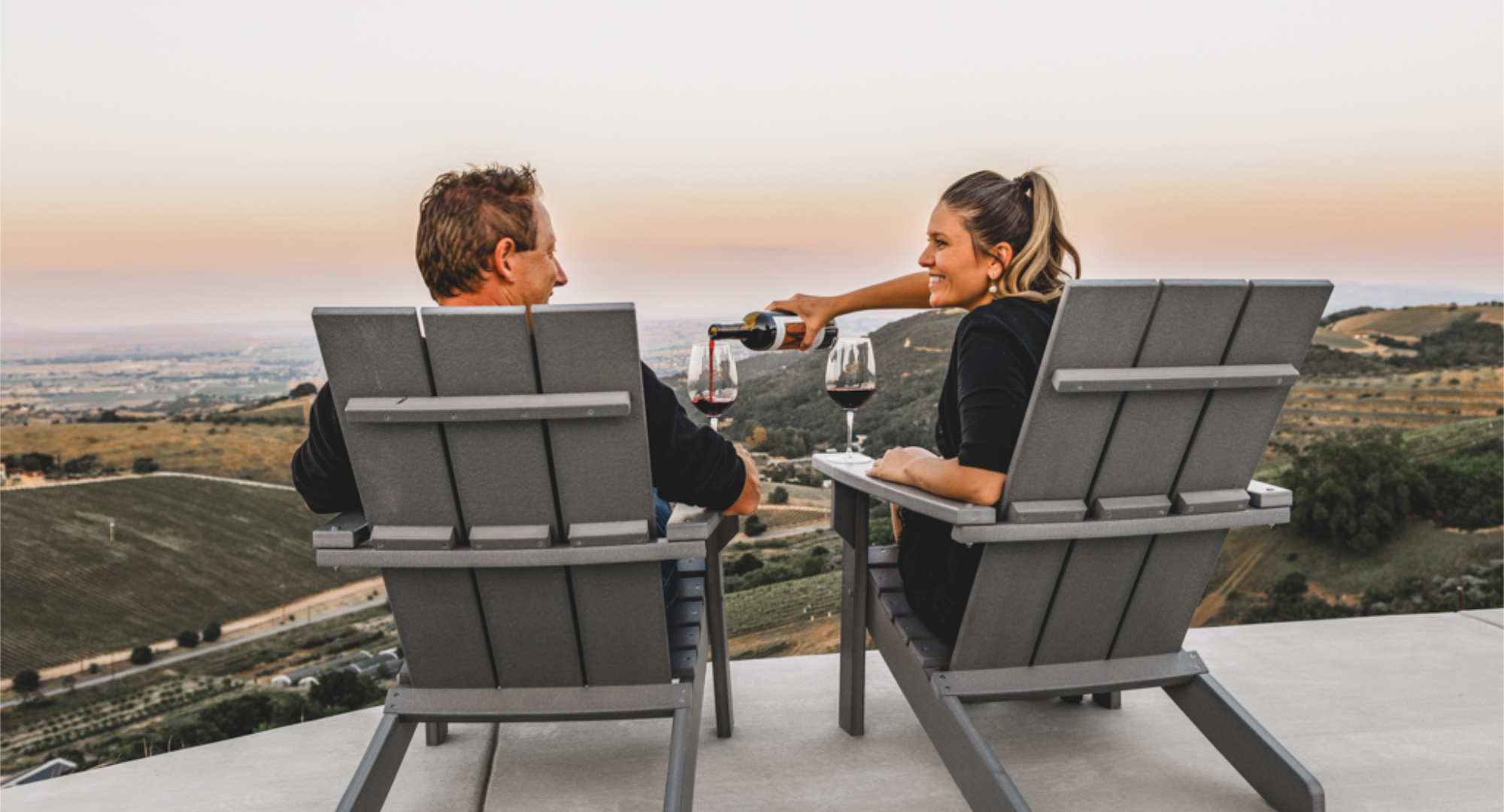 Couple enjoying wine with a view