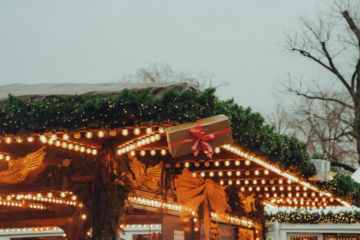 lights on a vendor stall at a christmas market