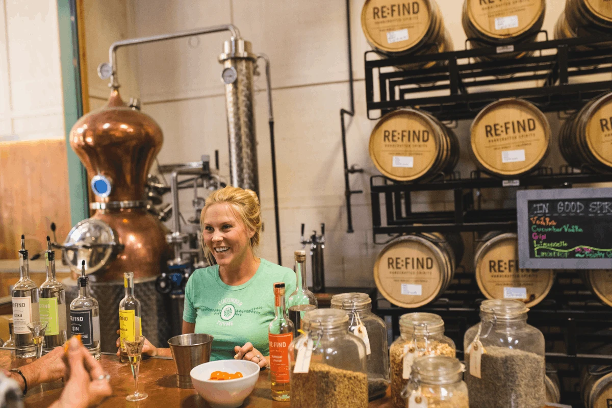 person serving spirits at a distillery in paso robles