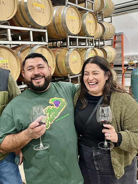 Couple having fun in a barrel room