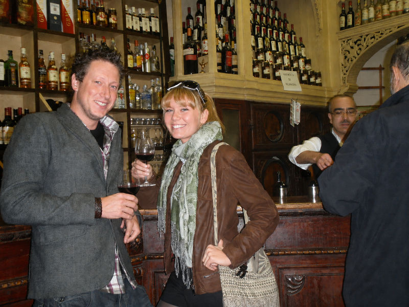 Lars Kristina drinking wine in bar in Spain